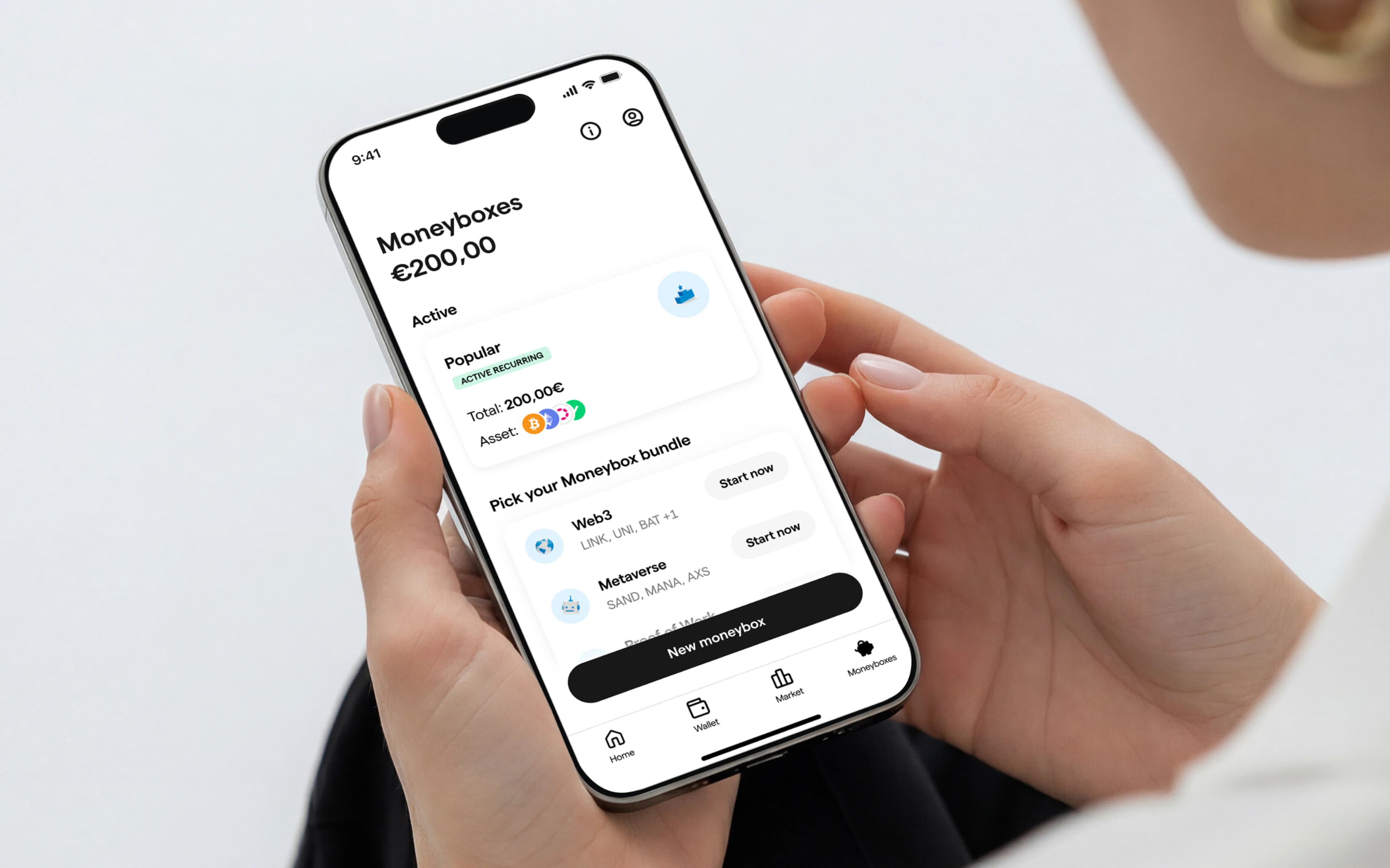 A person using Moneyboxes on their phone