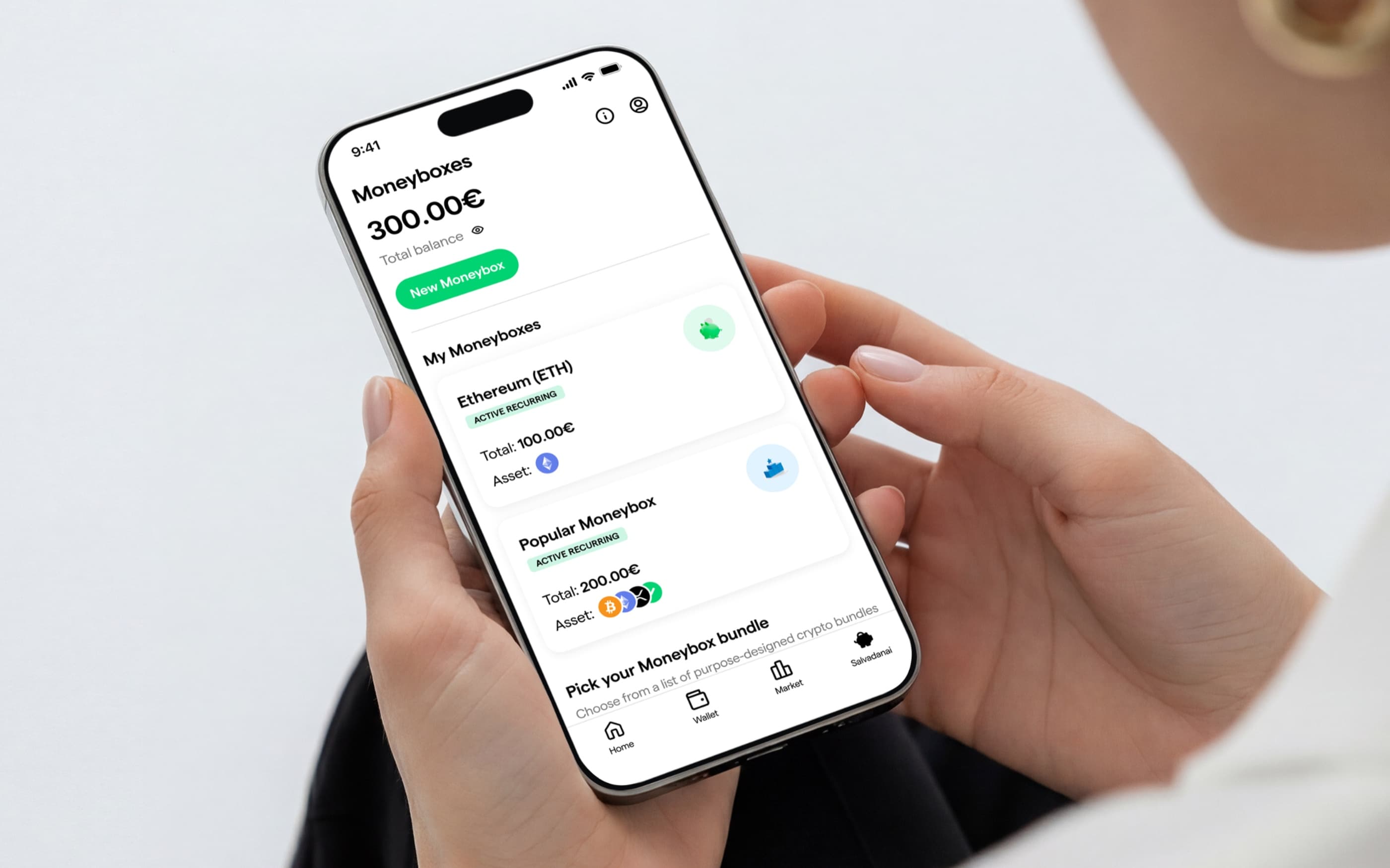 A person using Moneyboxes on their phone