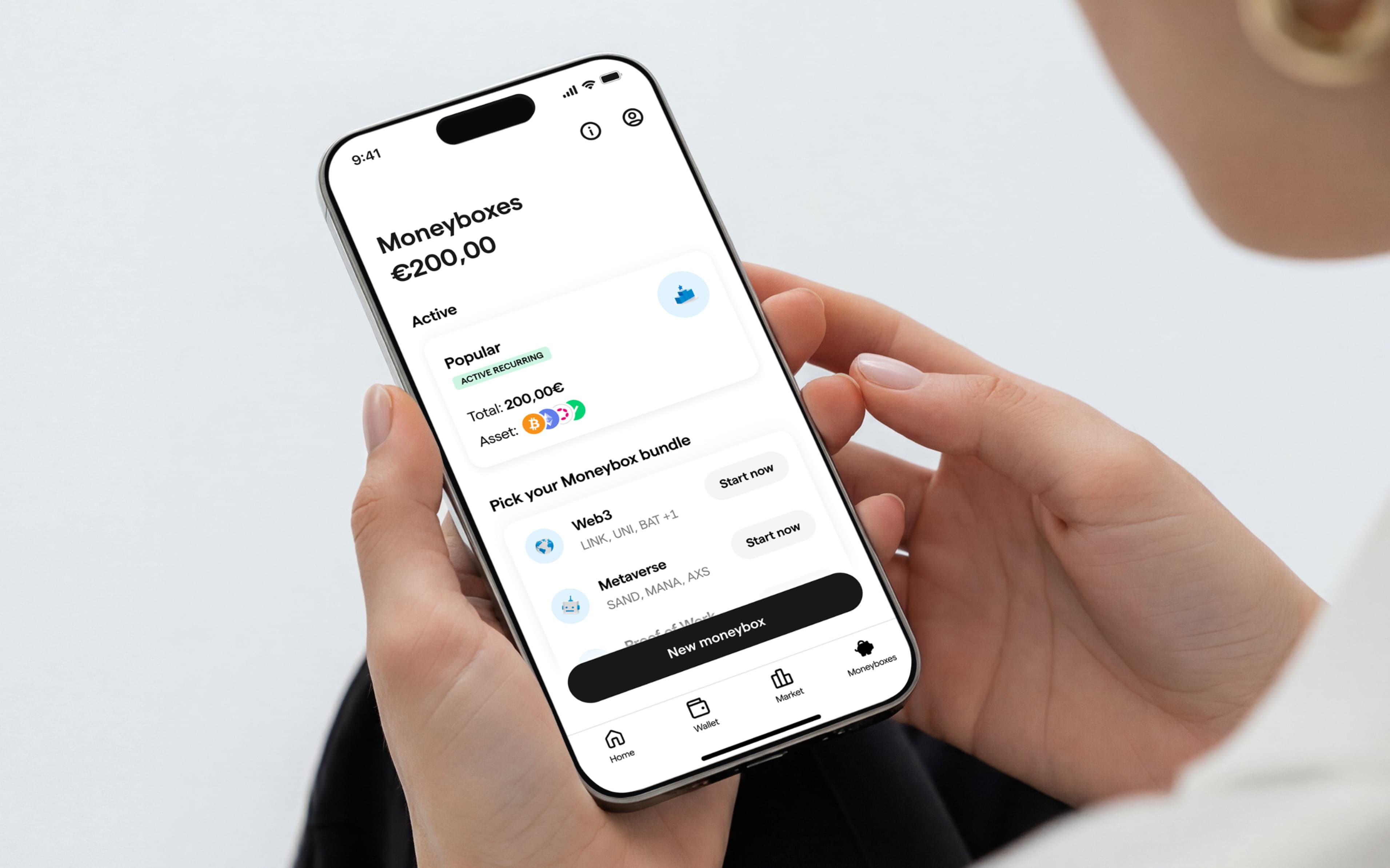 A person using Moneyboxes on their phone